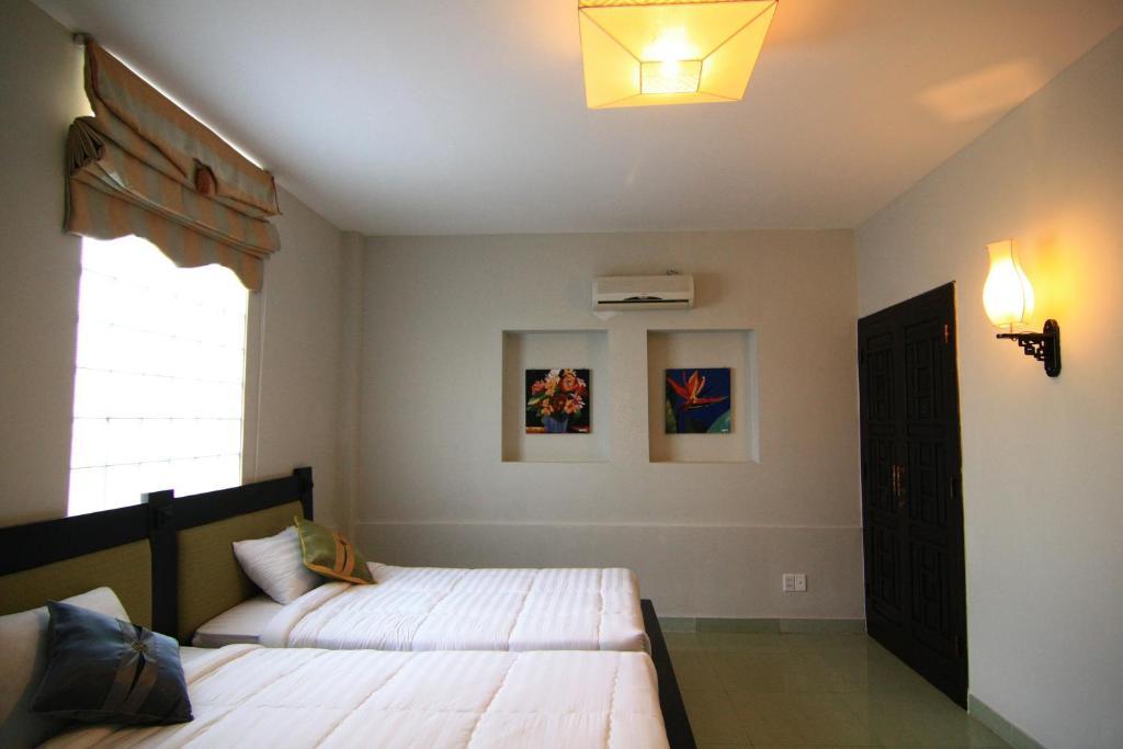 Faifoo Boutique Hotel Хошимин Номер фото