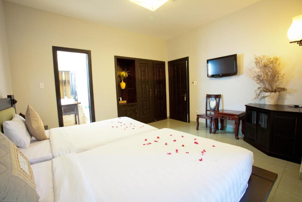 Faifoo Boutique Hotel Хошимин Номер фото