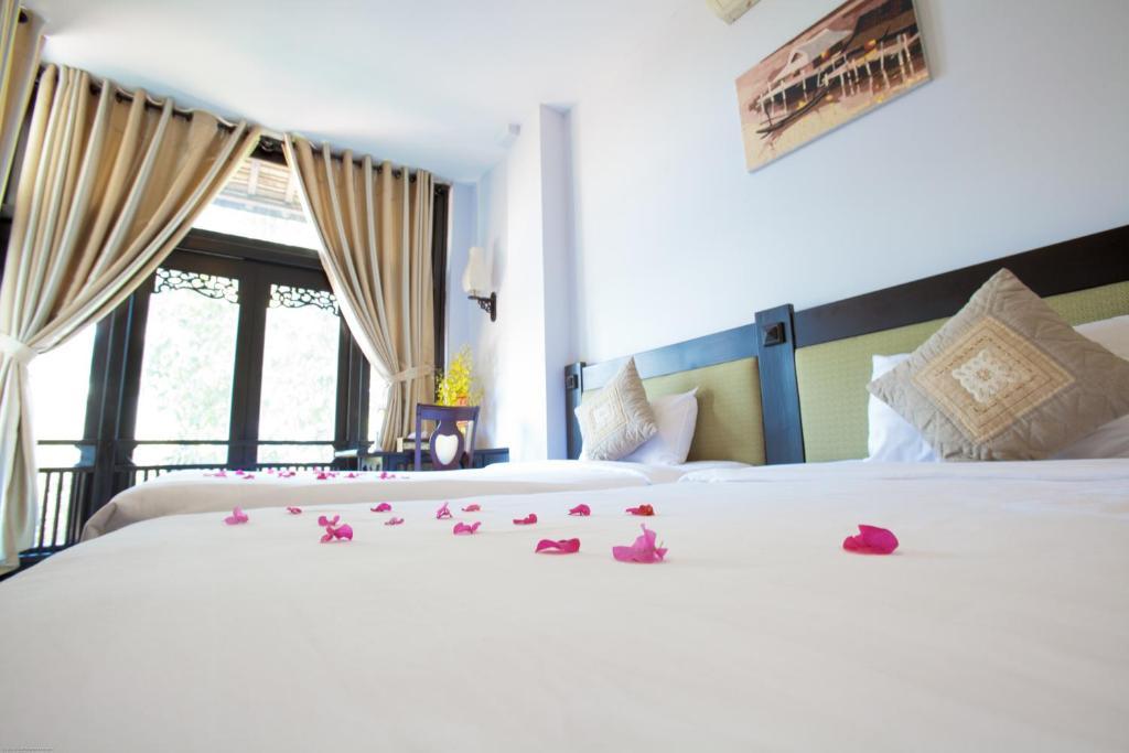 Faifoo Boutique Hotel Хошимин Номер фото