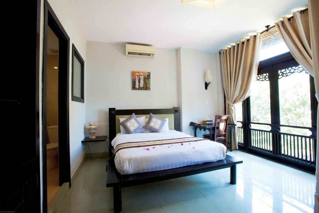 Faifoo Boutique Hotel Хошимин Номер фото