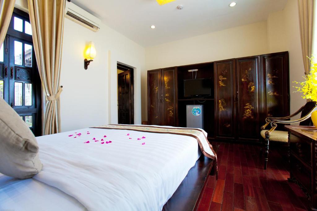 Faifoo Boutique Hotel Хошимин Номер фото